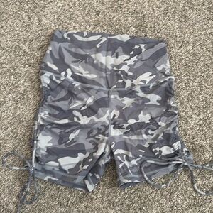 Better Bodies scrunch butt camo shorts.